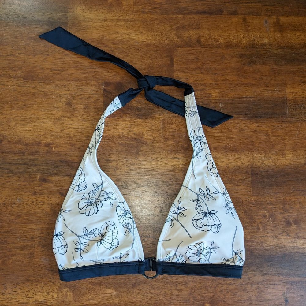Calvin Klein's Halter Bikini Top with a Floral Print in Pink and Black